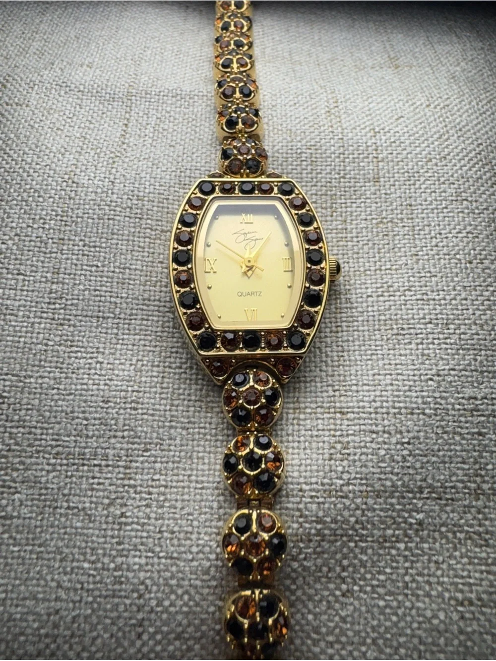 Gold-Tone Garnet Accent Womens Bracelet Watch